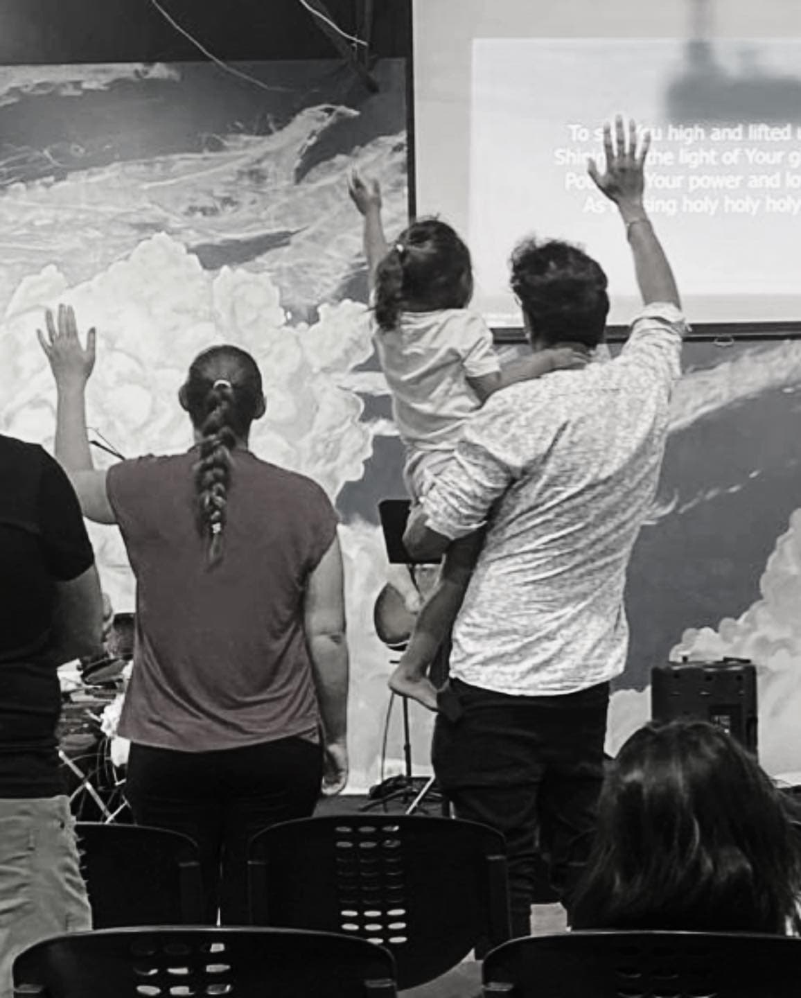 ODCF worship service with congregation praising together
